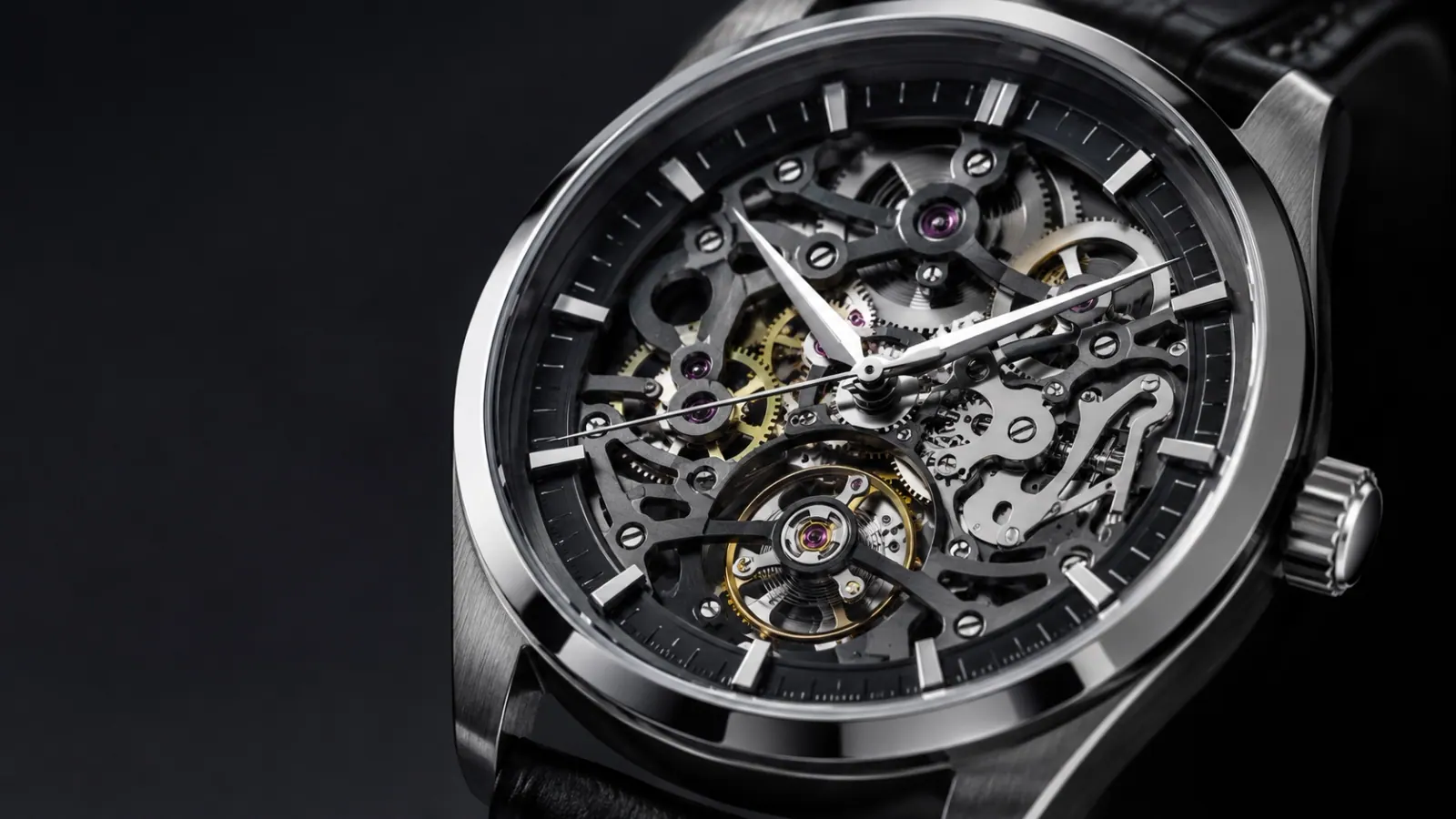Skeleton watch dial exposing the gear train